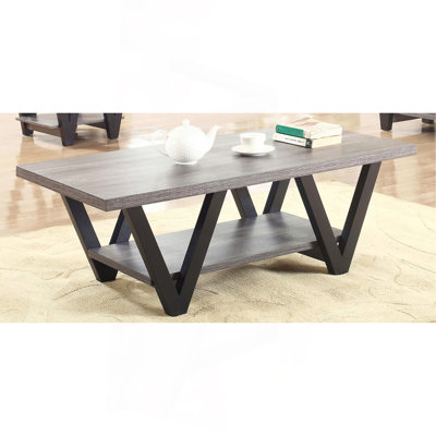 Table basse à pieds noirs et gris