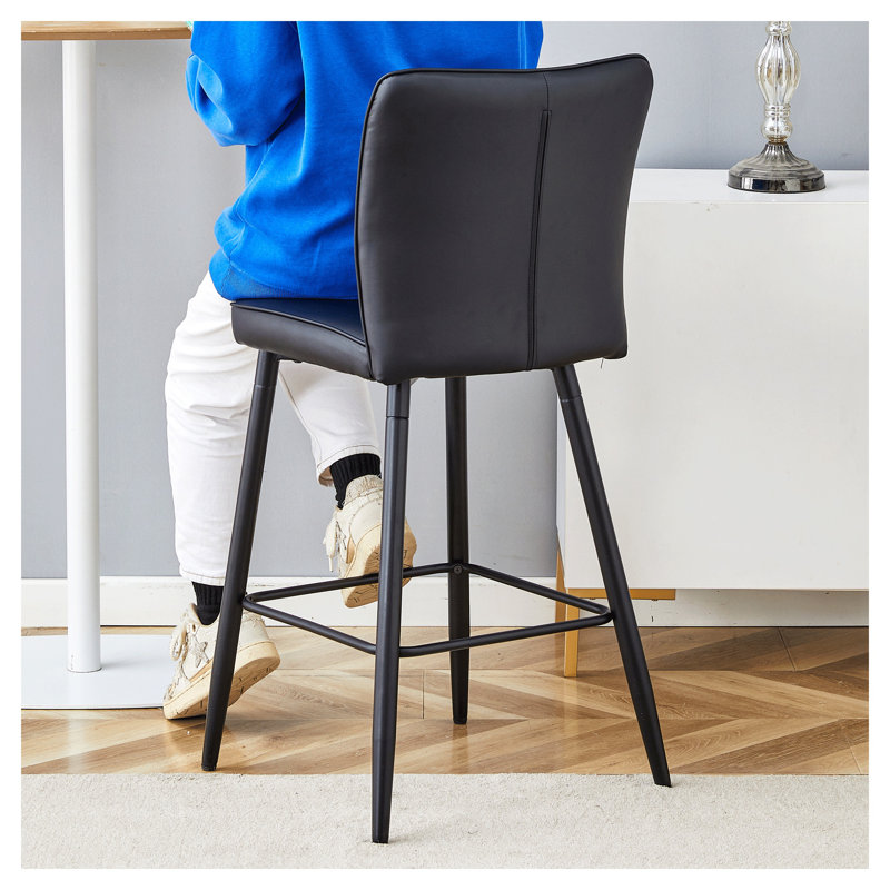 Ensemble de 2 tabourets de bar noirs modernes - Chaises à hauteur de comptoir en cuir synthétique avec pieds et repose-pieds en métal pour îlot de cuisine, salle à manger et bar personnel