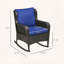 Chaise berçante en osier avec assise large et coussins épais
