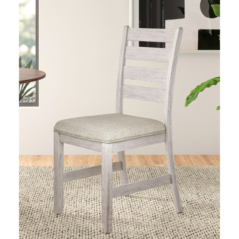 Ensemble de repas de 5 pièces pour se détendre - Table rectangulaire en bois avec 4 chaises, assises en tissu gris-blanc et brun, style décontracté.