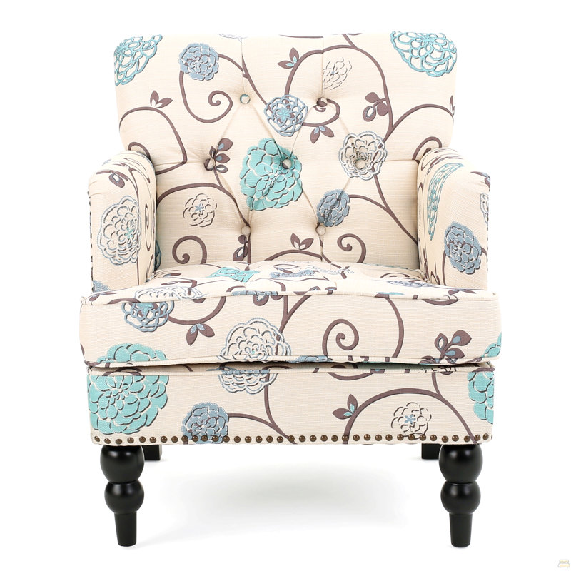 Fauteuil club capitonné