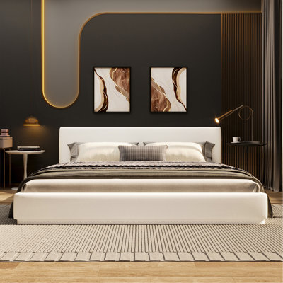 Queen size upholstered bed with soft headboard
