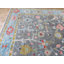Tapis unique gris de 9 pi 11 po x 10 pi 1 po