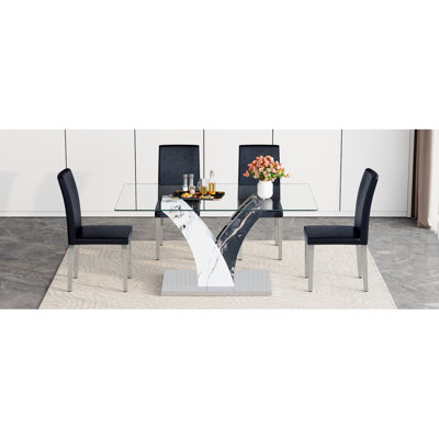 Ensemble de table et de chaises. Table de salle à manger moderne, comptoir en verre trempé et pieds en panneau de fibres à densité moyenne artistiques. Avec 4 chaises de salle à manger en polyuréthane noir, pieds en métal argenté. Simple et polyvalent. Rembourrage en éponge à haute élasticité.