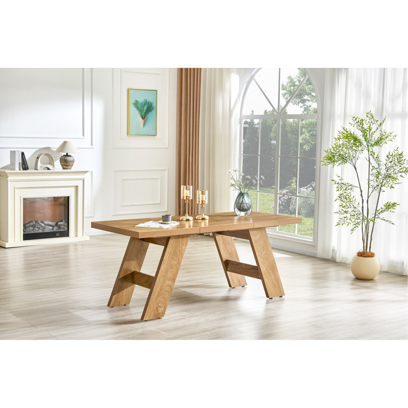 Table de salle à manger rectangulaire en bois aggloméré de 71 po x 31,5 po d'épaisseur avec pieds en bois à double panneau incliné vers l'extérieur. Table de salle à manger moderne pour un usage domestique. Accueille 6 à 8 personnes, polyvalent pour de multiples cas de figure.