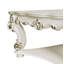 Table basse Vendome avec pieds à volutes et garniture décorative, parfaite pour les espaces de vie élégants
