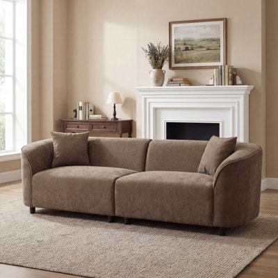 Canapé incurvé contemporain : assise moelleuse, design épuré et structure robuste