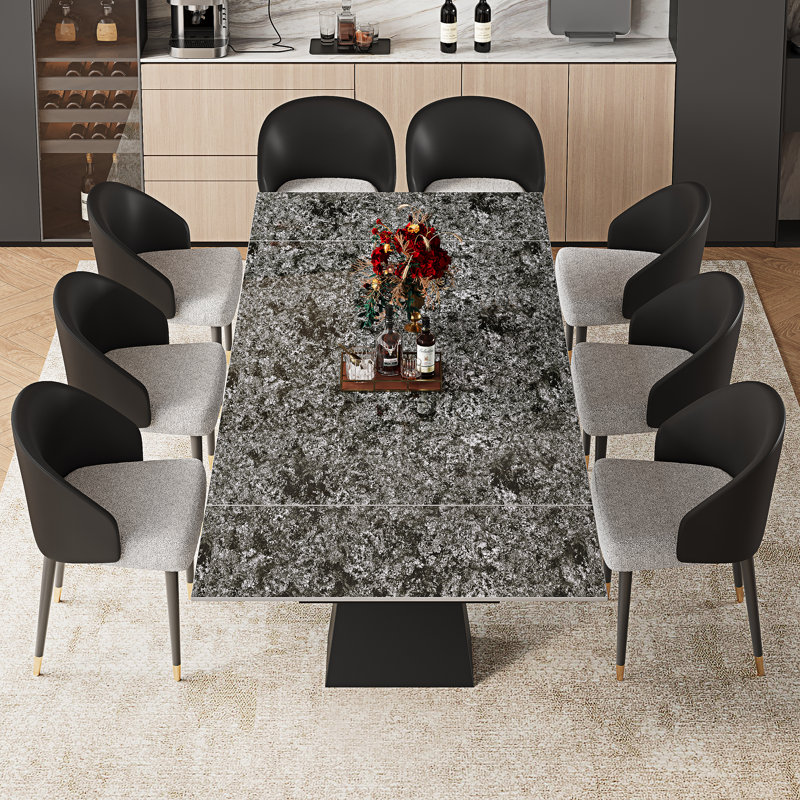 9-Piece Dining Set With 110.24'' Extendable Sintered Stone Table Top, 8 Upholstered Faux Leather Dining Chairs & Metal Base