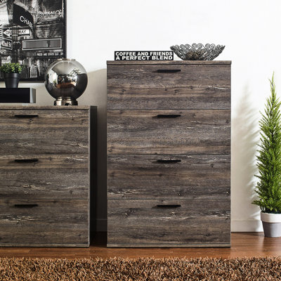Le coffre rustique gris avec surface et glissières de tiroir assure un mouvement fluide -
