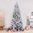 Fraser Hill Farm 10-Ft. Alaskan Pine Flocked Artificial Christmas Tree with Dual Multicolor & Warm White LED Lights