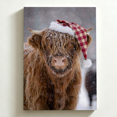 Tableau photographique de Noël représentant une vache des Highlands dans la neige profonde, impression sur toile tendue sur châssis, 50 x 75 cm, décoration murale sereine et enneigée marron et blanche pour salon, chambre et couloir.