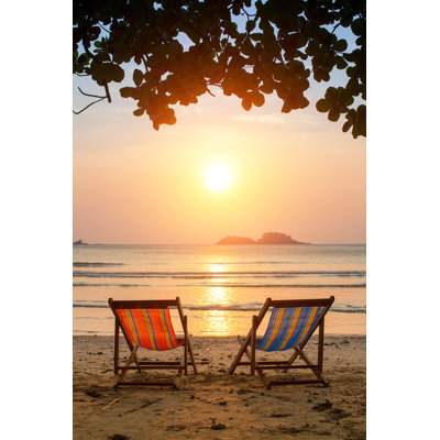 Loungers On Beach At Sunrise by Dimaberkut - Wrapped Canvas Print