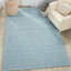 Tapis bleu ciel en laine tissé à la main-279902405