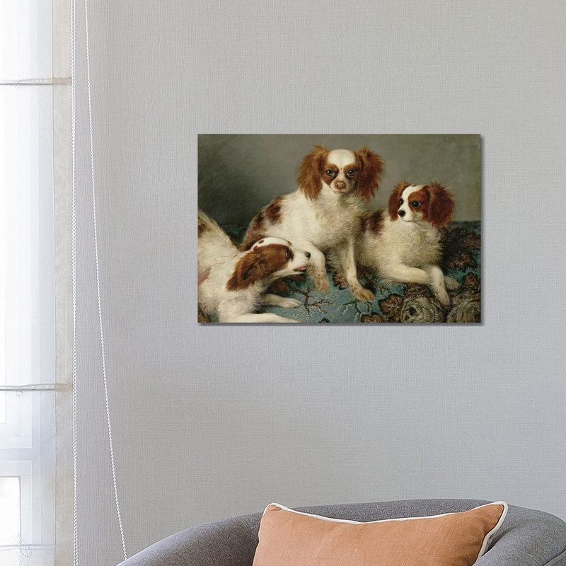Three Cavalier King Charles Spaniels On A Rug - Wrapped Canvas Painting