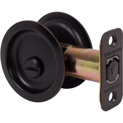 Serrure ronde pour porte escamotable