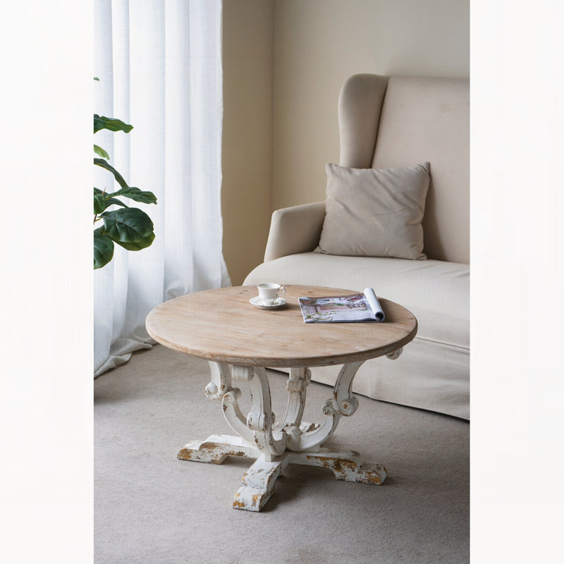 Table basse ronde en bois 31,5 x 31,5 x 18,5 po avec finition blanche patinée et pieds à volutes