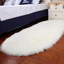 Oval Solid Colour Faux Sheepskin 180cm X 100cm Area Rug