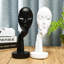 Adsett Face Sculpture-1021888412-946902644