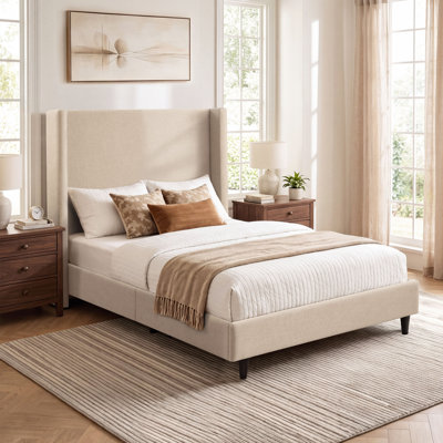 Ana Upholstered Wingback Bed