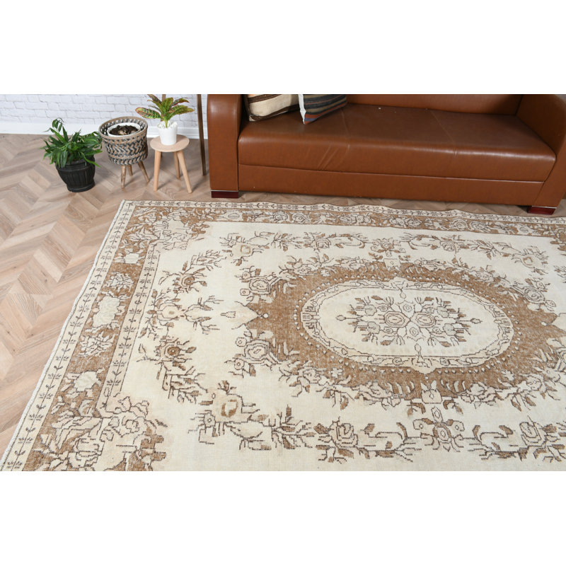 Tapis turc en laine tissé à la main dans un motif floral beige et brun pour un décor de salon élégant