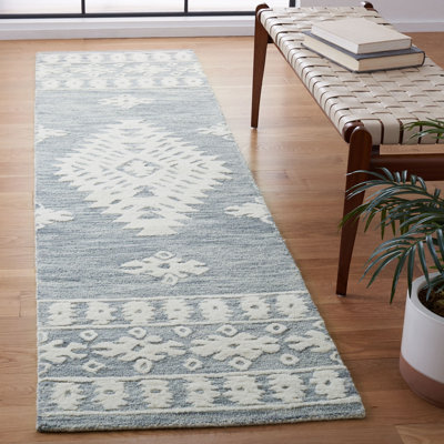 Tapis gris clair en laine / coton touffeté à la main
