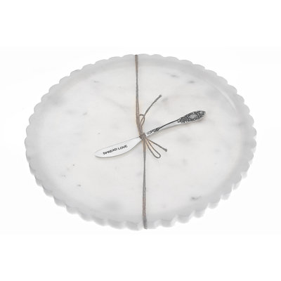 Assiette et épandeur en marbre blanc festonné