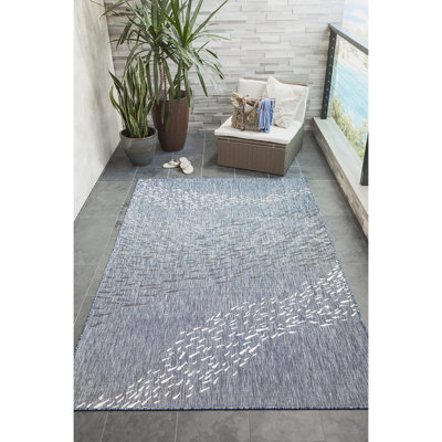 Tapis bleu marine tissé à la machine