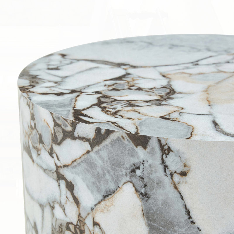 Table basse cylindrique texturée en marbre blanc