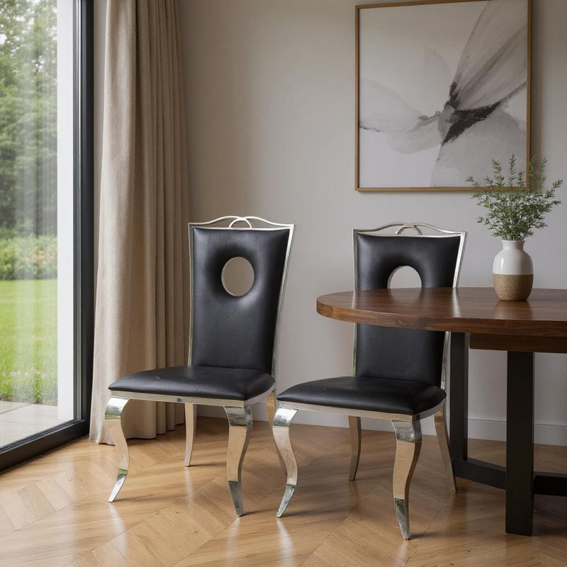 Ensemble de deux chaises d'appoint de salle à manger rembourrées en similicuir noir et argent