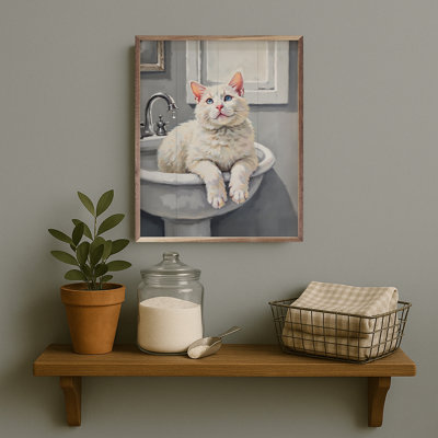 Chat blanc dans l'évier