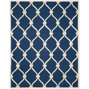 https://assets.wfcdn.com/im/82144353/resize-h300-w300%5Ecompr-r85/6163/61639452/Erol%C2%A0%C2%A0+Wool+Geometric+Rug.jpg