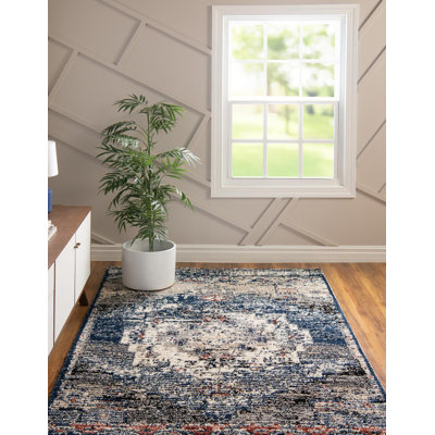 Tapis bleu / beige à motif abstrait Tucson