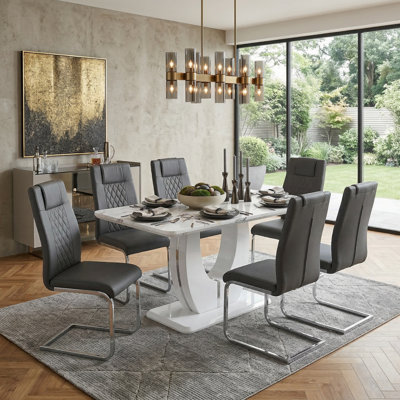 Jeanlouis Modern Pedestal Dining Set with Faux Marble Table & PU Leather Chairs