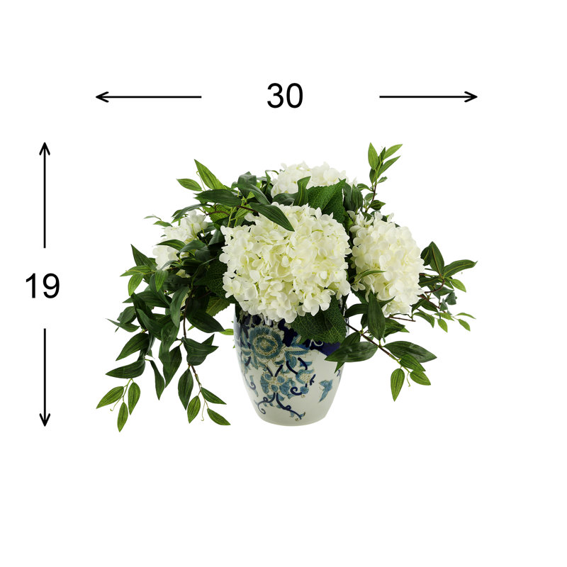 Hydrangea and Ruscus Arrangement in A Ceramic Vase