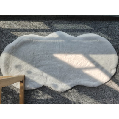 Tapis blanc en fausse fourrure Modena