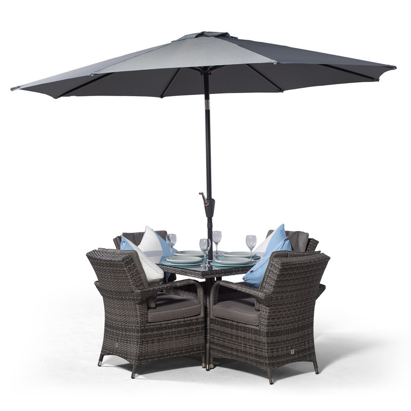 Karas 4 - Person Wicker Patio Dining Set with Square Table , Cushions Included
