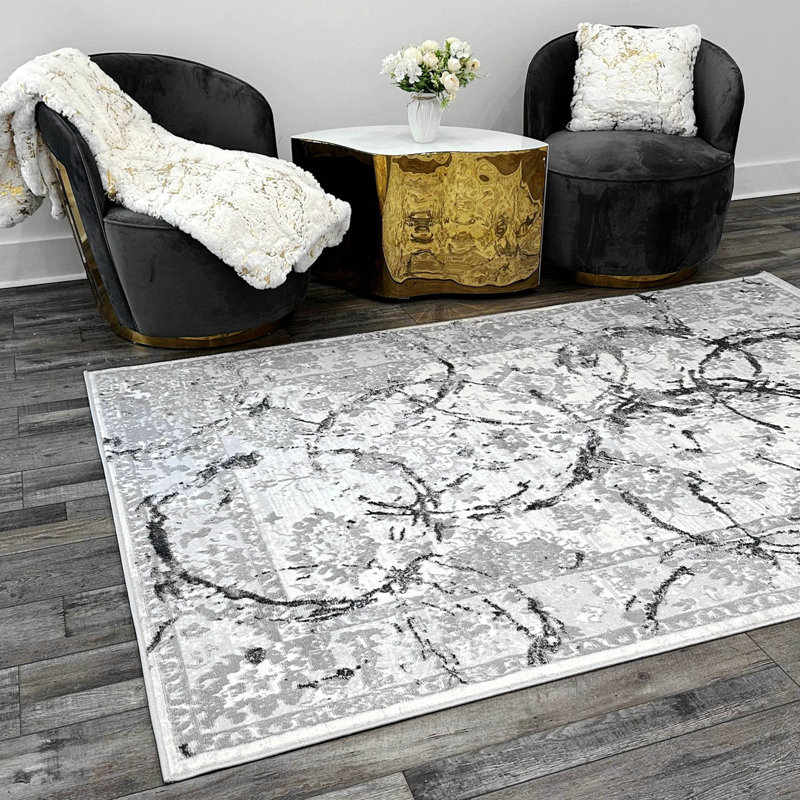 Tapis à motif abstrait de luxe avec cercles argentés Penina