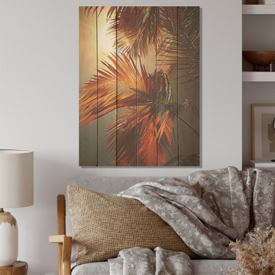 Coucher de soleil sur des feuilles de palmier tropical - palmiers et palmiers, art sur bois de pin naturel