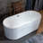 Pavanjit 67" x 32" Freestanding Acrylic Bathtub, Unique Artistic Design, Soaking Tub in White-88621950
