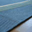 Tapis rectangulaire en laine-90073909