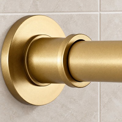 Une tringle à rideau de douche en acier inoxydable doré coucher de soleil, à ressort et réglable de 18 à 64 pouces ; sa conception antidérapante permet une installation sans perçage pour les fenêtres ou les salles de bains.