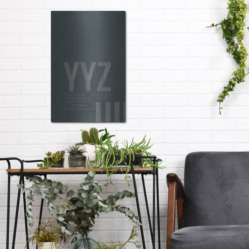 "YYZ" par O8 à gauche, H 16 po x l 12 po