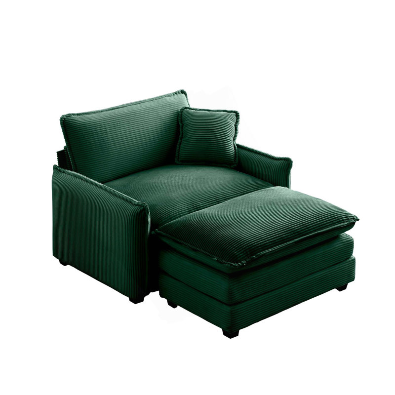 Canapé simple à assise profonde avec repose-pieds et coussin, salon