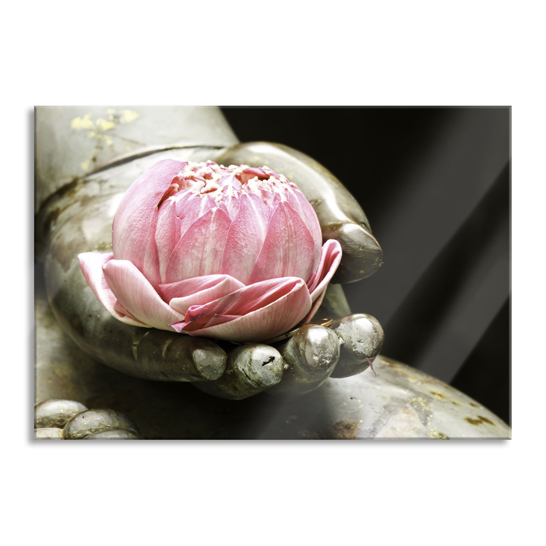 Glasbild Lotus in der Hand des Buddha