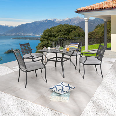 Ensemble de salle à manger 5 pièces en métal pour l'extérieur avec chaises à dossier en treillis et coussins gris