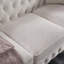 Canapé Chesterfield en tissu beige