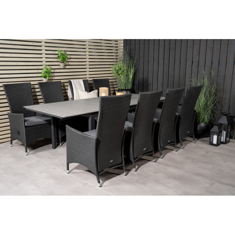 Alamea 8 - Person Patio Dining Set with Extendable Rectangular Table , Cushions Included, Black