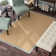 Nannette Handmade Medium Beige Berber with Ice Blue Cotton Border Area Rug