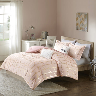 Édredon doux rosé avec coussins décoratifs dorés
