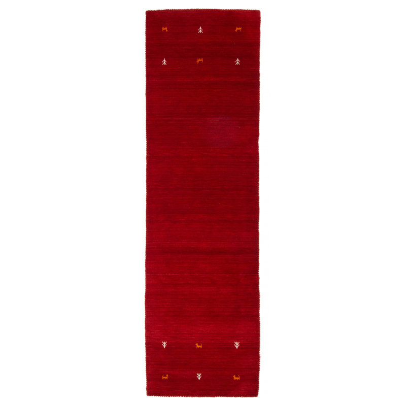 Les tapis Gabbeh sont fabriqués à la main avec des poils très hauts et des motifs très simples et stylisés.